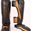 Venum Elite Evo Kickboks Scheenbeschermers Zwart Brons Maat M