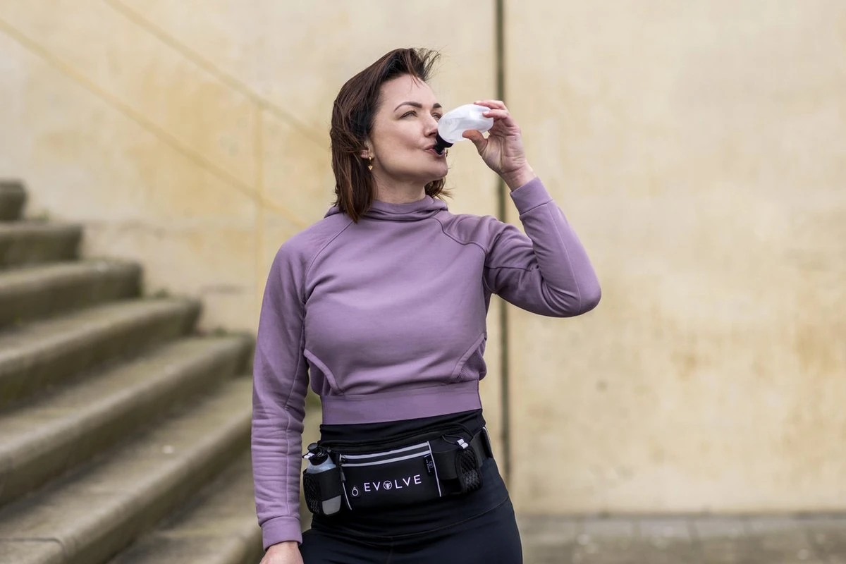 Fit Evolve® Sport Heupband - Hardloopband Telefoonhouder - Sportband - Drinkgordel - Running Belt Bidonhouder - Hardloopriem Met Drinkflessen - Zwart - Onesize 12 Fit Evolve® Sport Heupband - Hardloopband Telefoonhouder - Sportband - Drinkgordel - Running Belt Bidonhouder - Hardloopriem Met Drinkflessen - Zwart - Onesize - Afbeelding 12